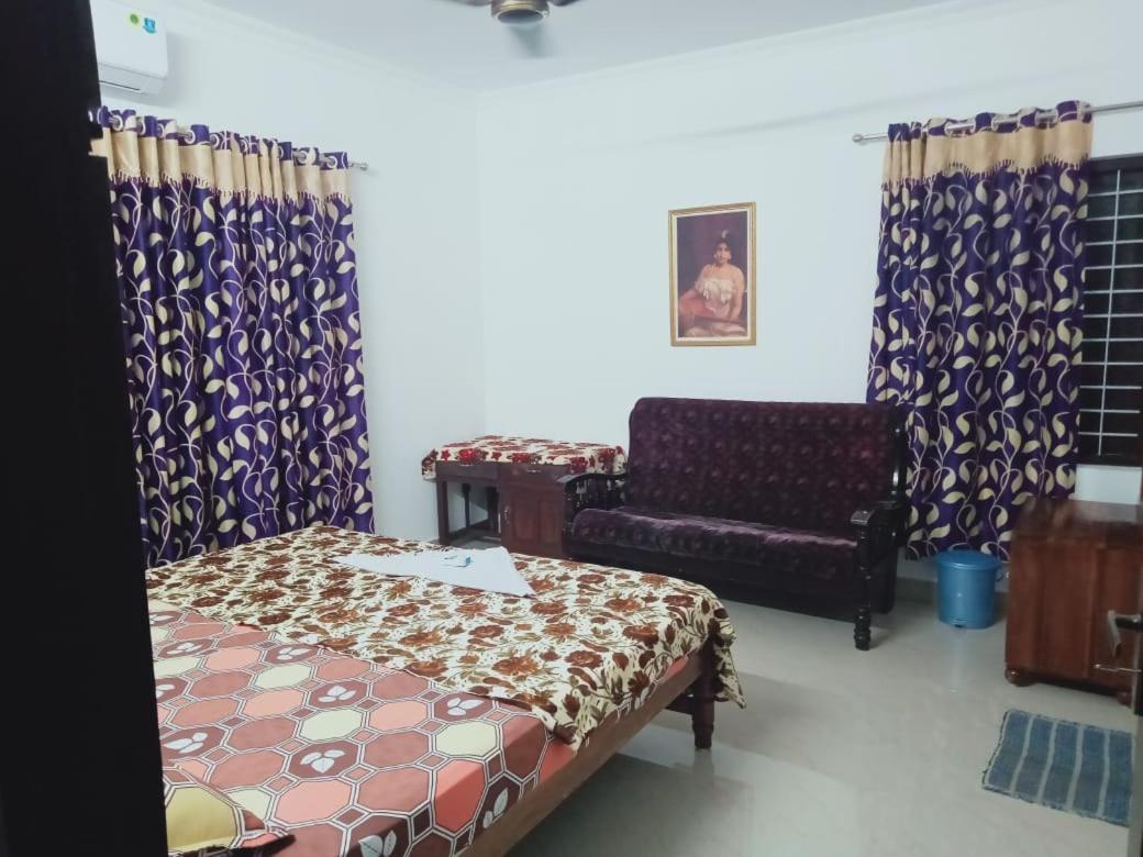 Karma Homestay Mundrothuruth Szoba fotó